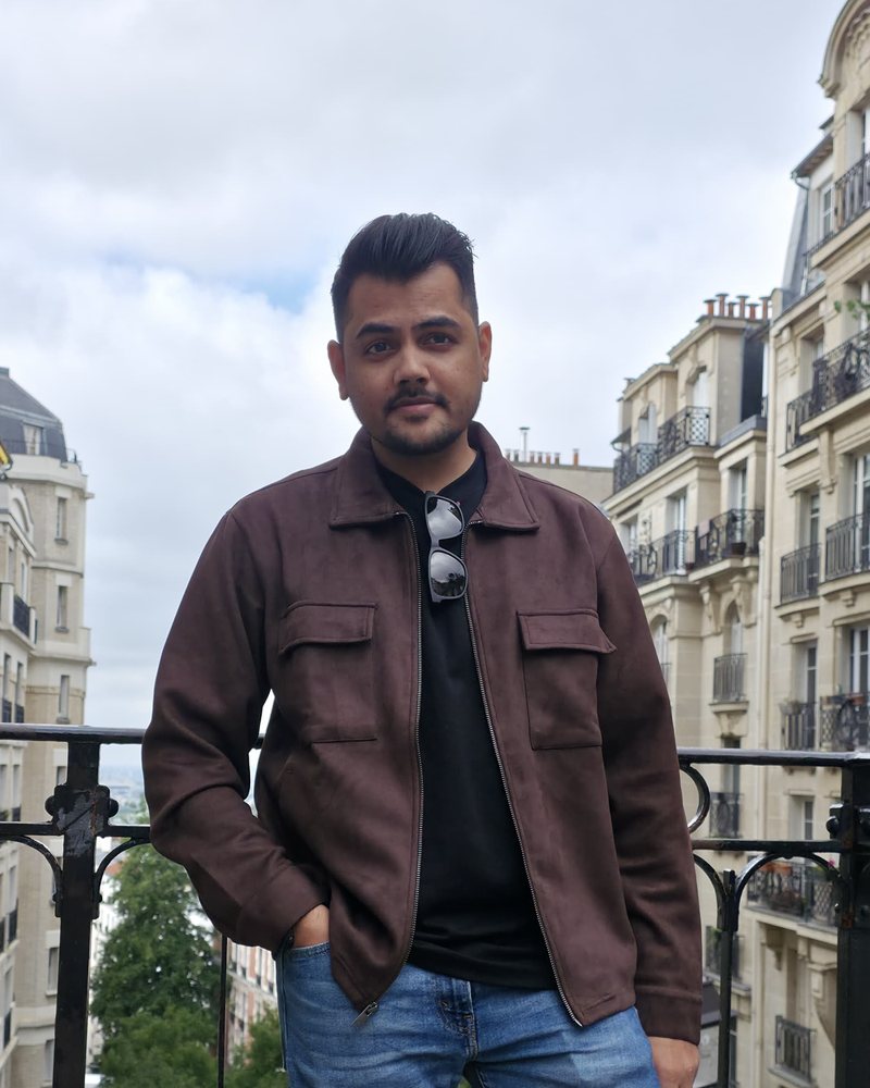 Shubham Somani on a balcony in Montmartre, Paris